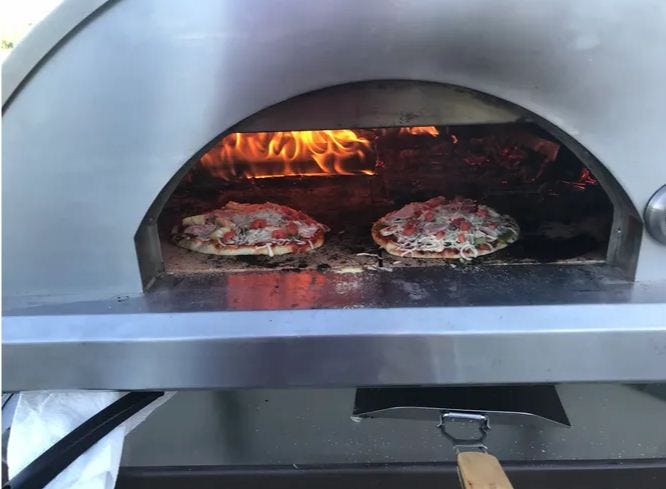Which Pizza Oven Is Right For You- Table Top Or Portable? | by Woodpellet  Pizzaoven | Medium