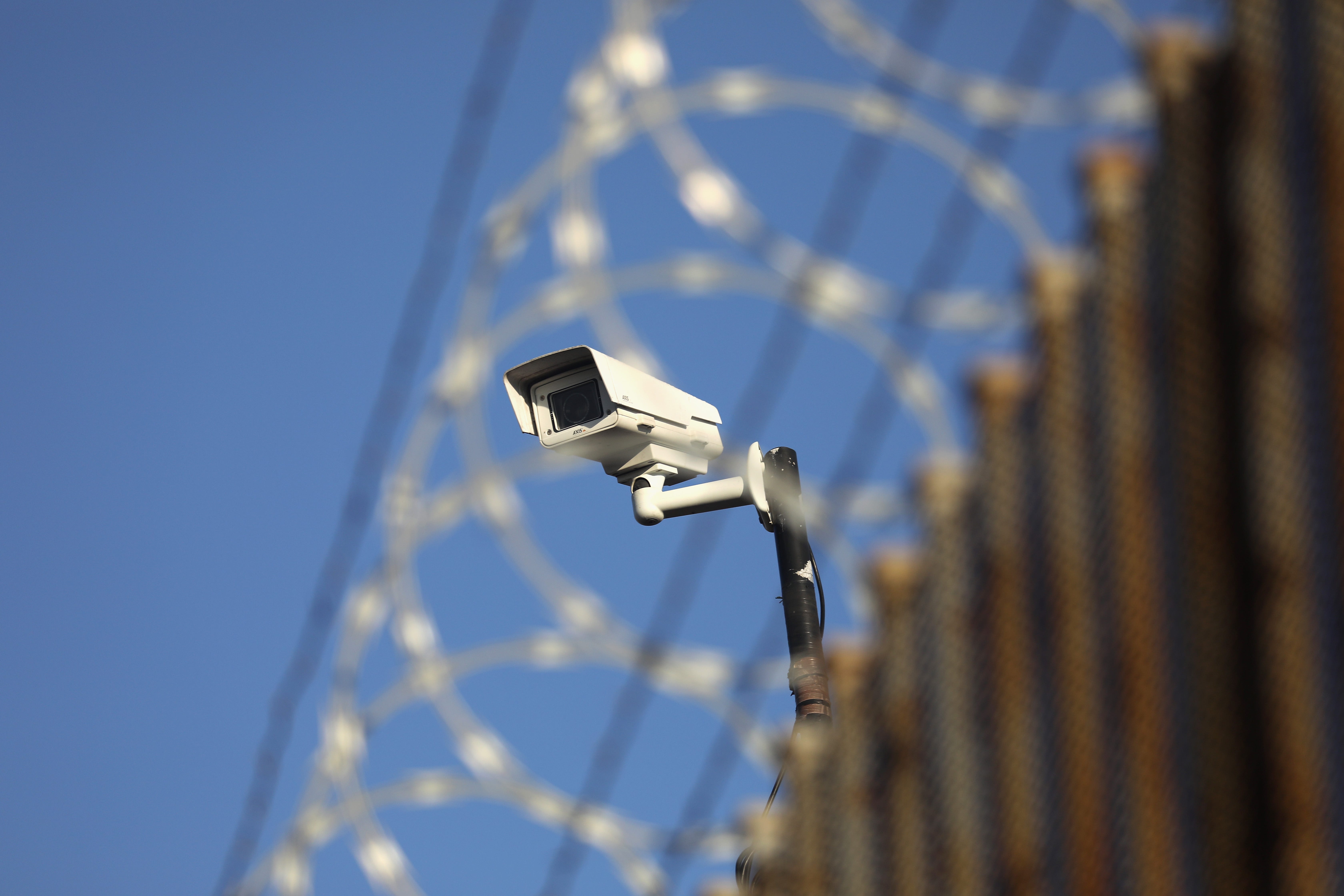 A U.S. surveillance camera overlooks the international bridge between Mexico and the United States.