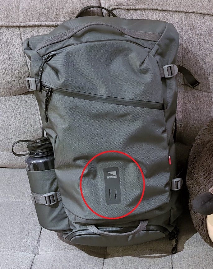 adding a water bottle holder to a backpack