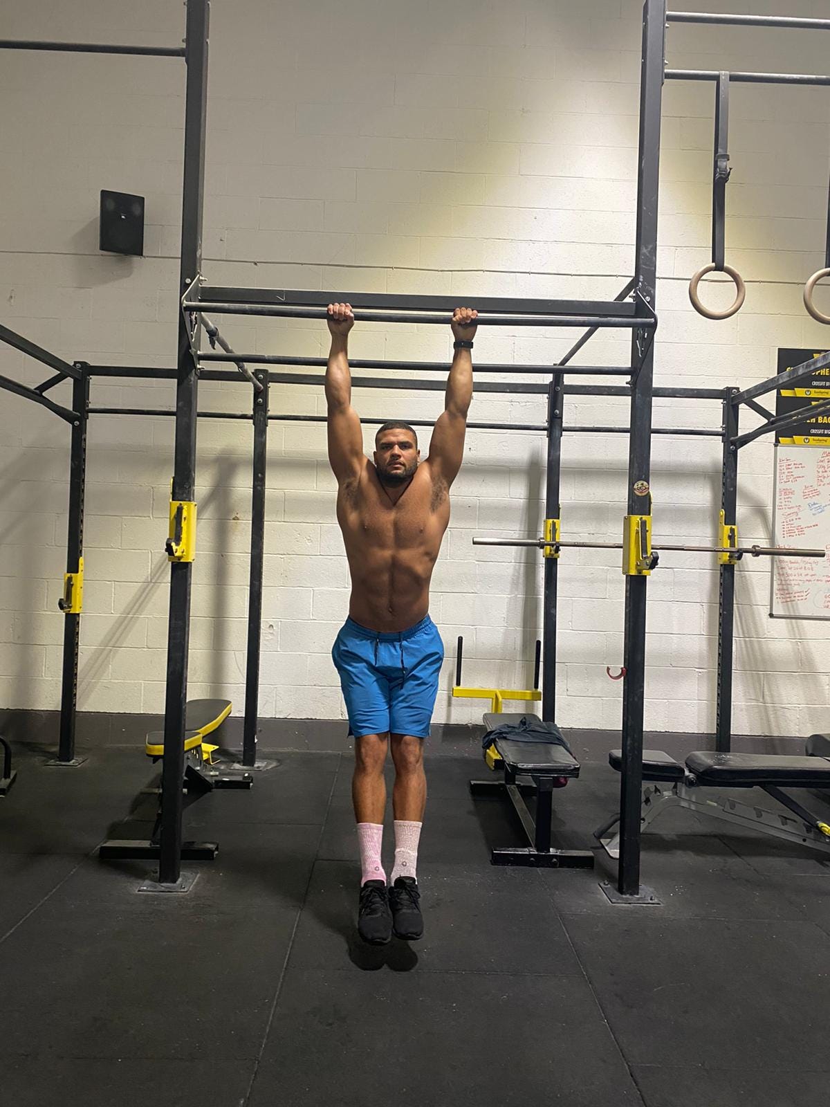 Zack George preparing to perform a pull-up.