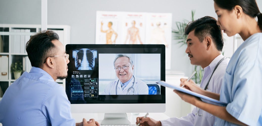 Doctors from Different Regions Collaborating Through Telehealth