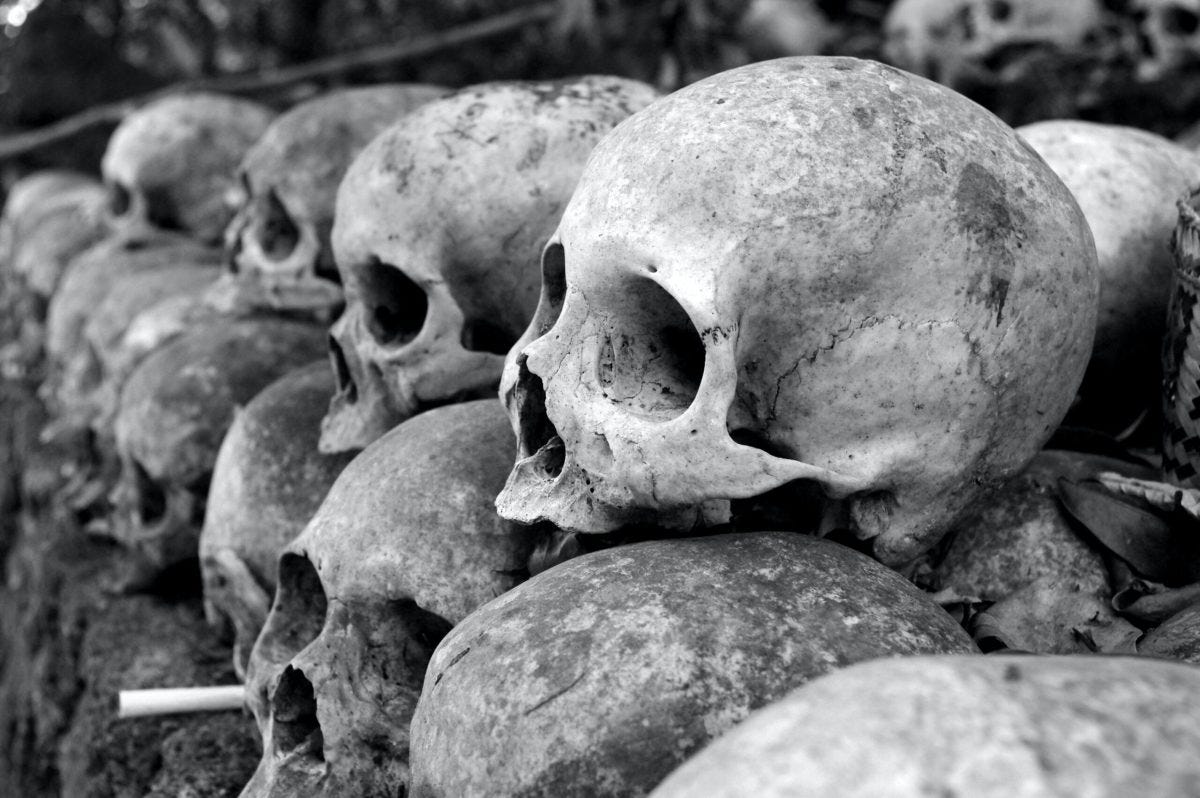 A wall of human stacked skulls.