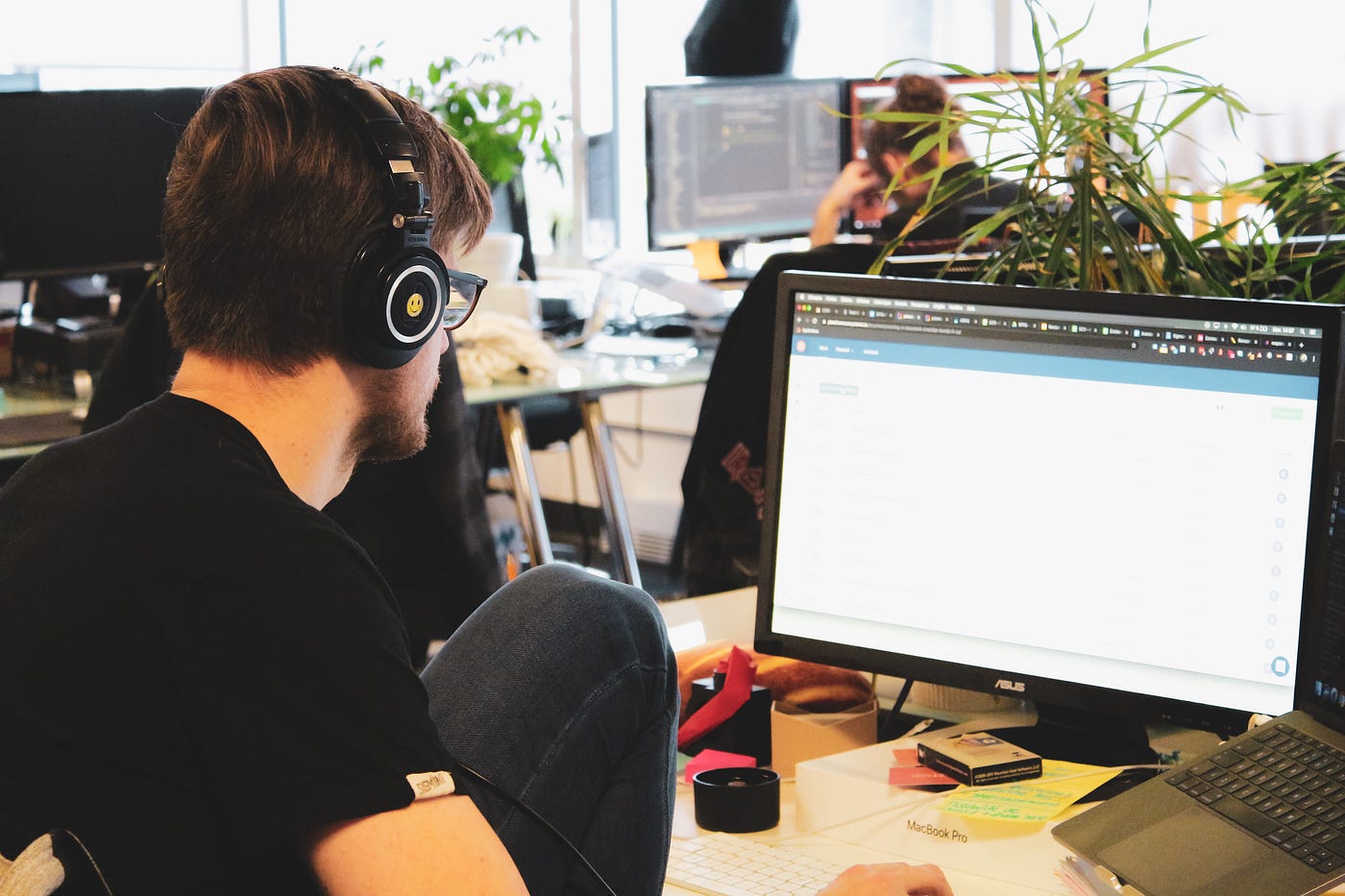 Web developer working at his desk