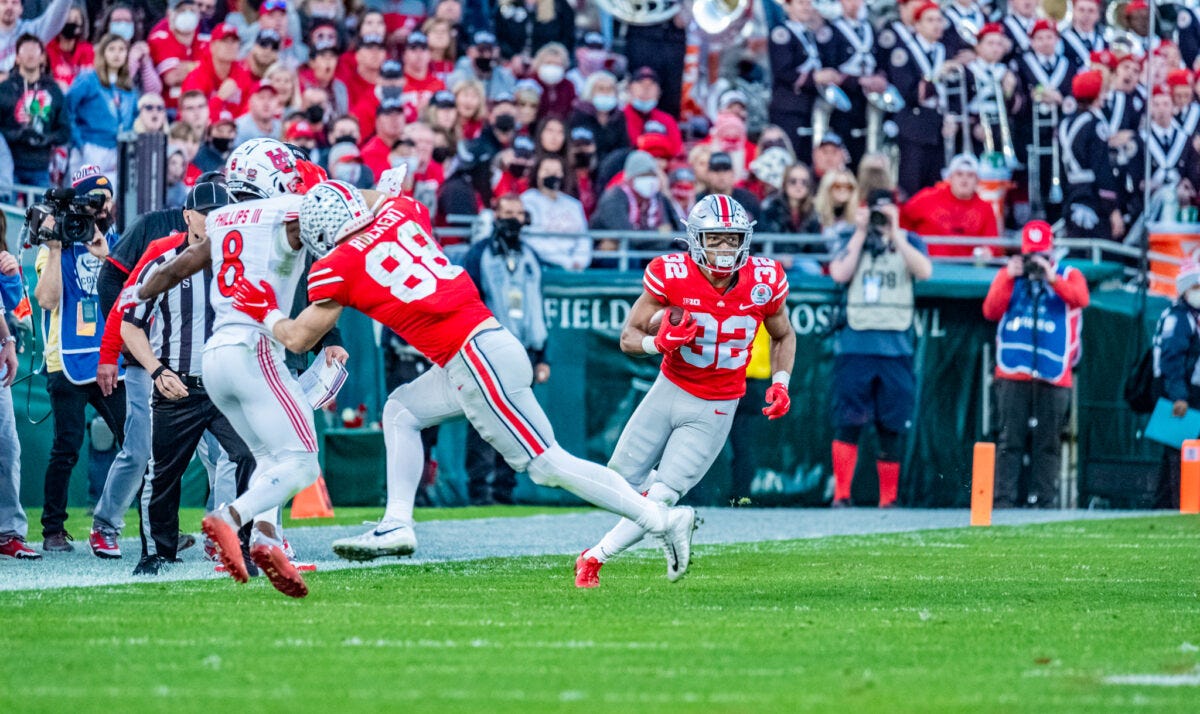 January 1, 2022. Ohio State running back Treveyon Henderson (32) goes up field against the Utah Utes in the 108th Rose Bowl Game played in Pasadena, California. Photo by Mark Hammond/News4usonline