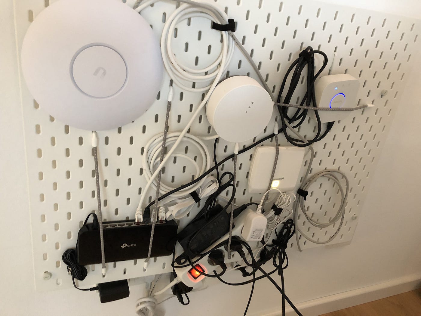 Using IKEA Skådis for networking gear and cable management | by Adrian  Thomas | Medium