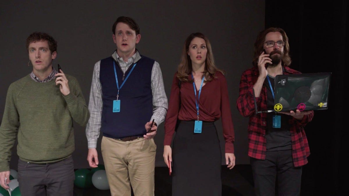 the main cast of Silicon Valley stand shoulder to shoulder with shocked expressions