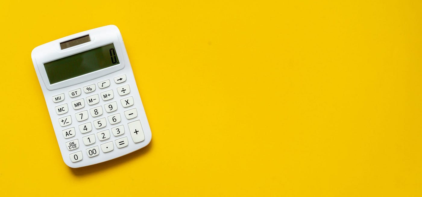 Calculator on yellow background