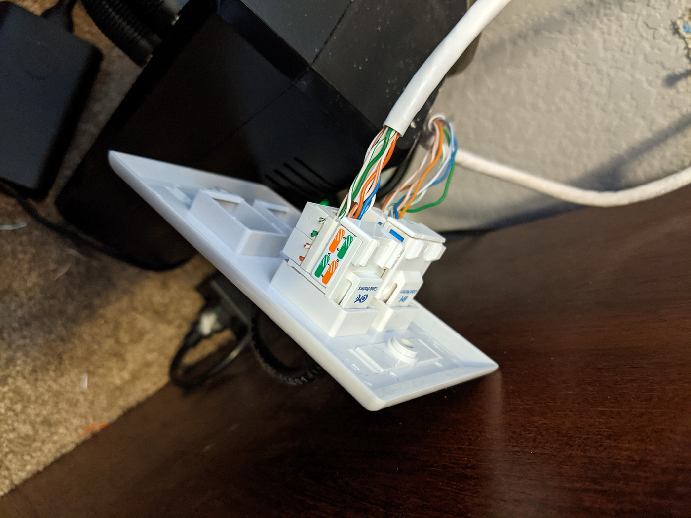 Keystone jack placed in wall panel