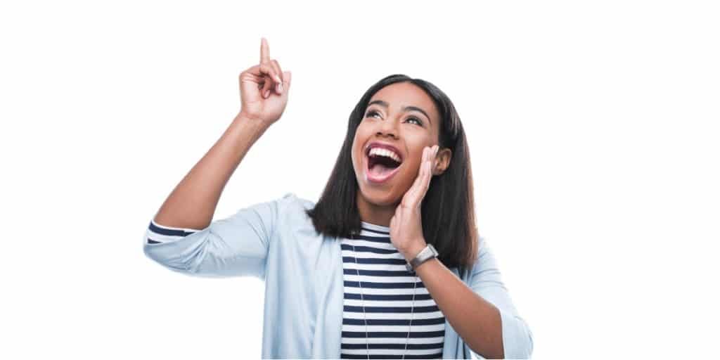 Lady looking happy ofter conquering her imposter syndrome