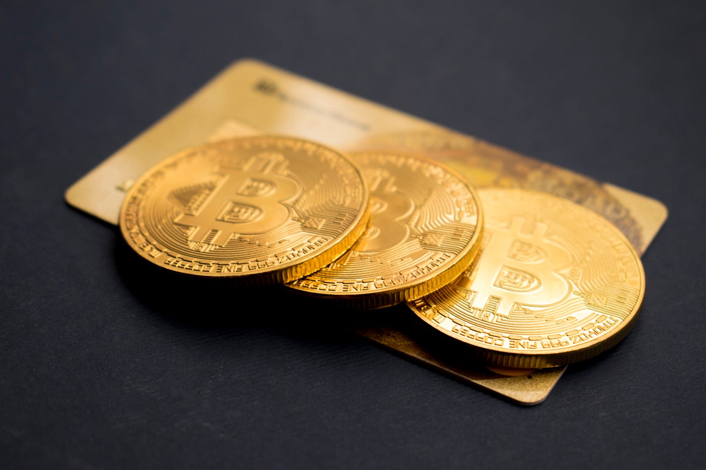 Bitcoins on a golden card