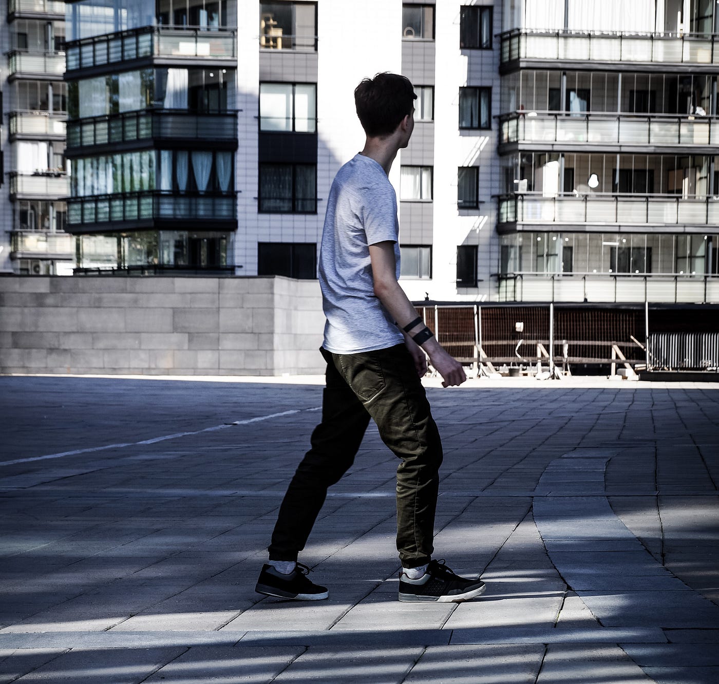 a person walking on the street in the city