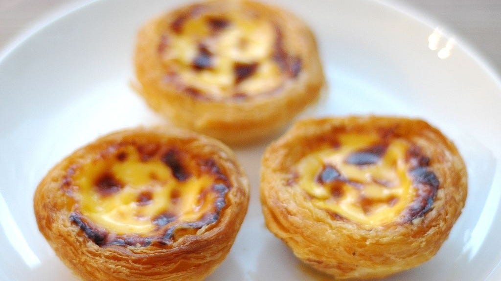 Jamie Oliver has tried to make one, but only in Portugal can you eat a  decent Pastel de Nata | by Manuel M Grillo | Medium