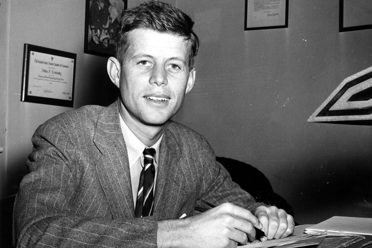 President John F Kennedy at his desk