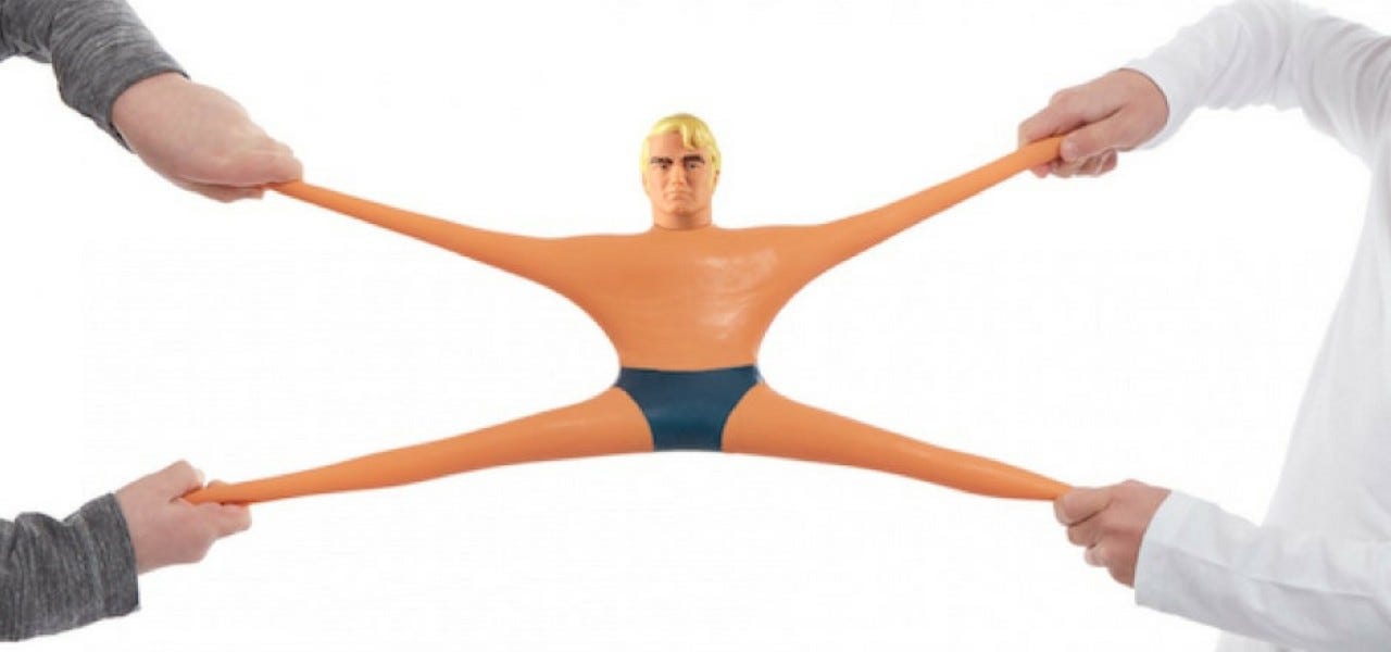 A toy figure being pulled in 4 different directions by his hands and feet