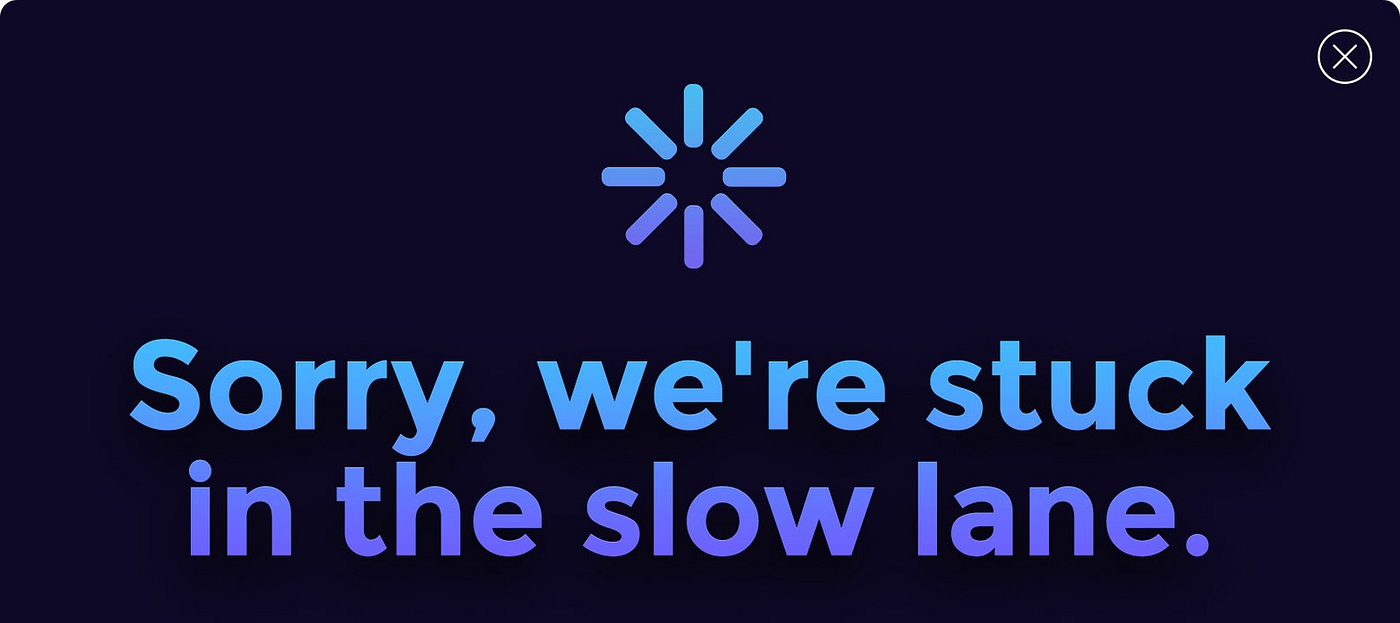 A black rectangular box with light-blue text in the middle that reads, “Sorry, we’re stuck in the slow lane.”