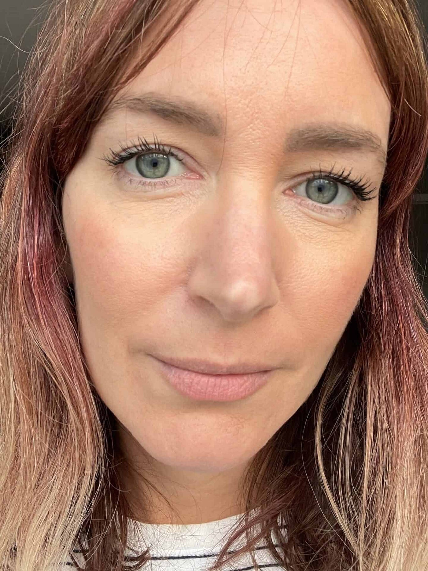 Becky Pink wearing Sukin tinted sunscreen, Madara CC Cream, Hynt Concealer, Love the Planet Powder and RMS Straight Up Mascara with more Sukin tinted Sheer Touch Sunscreen applied over the top