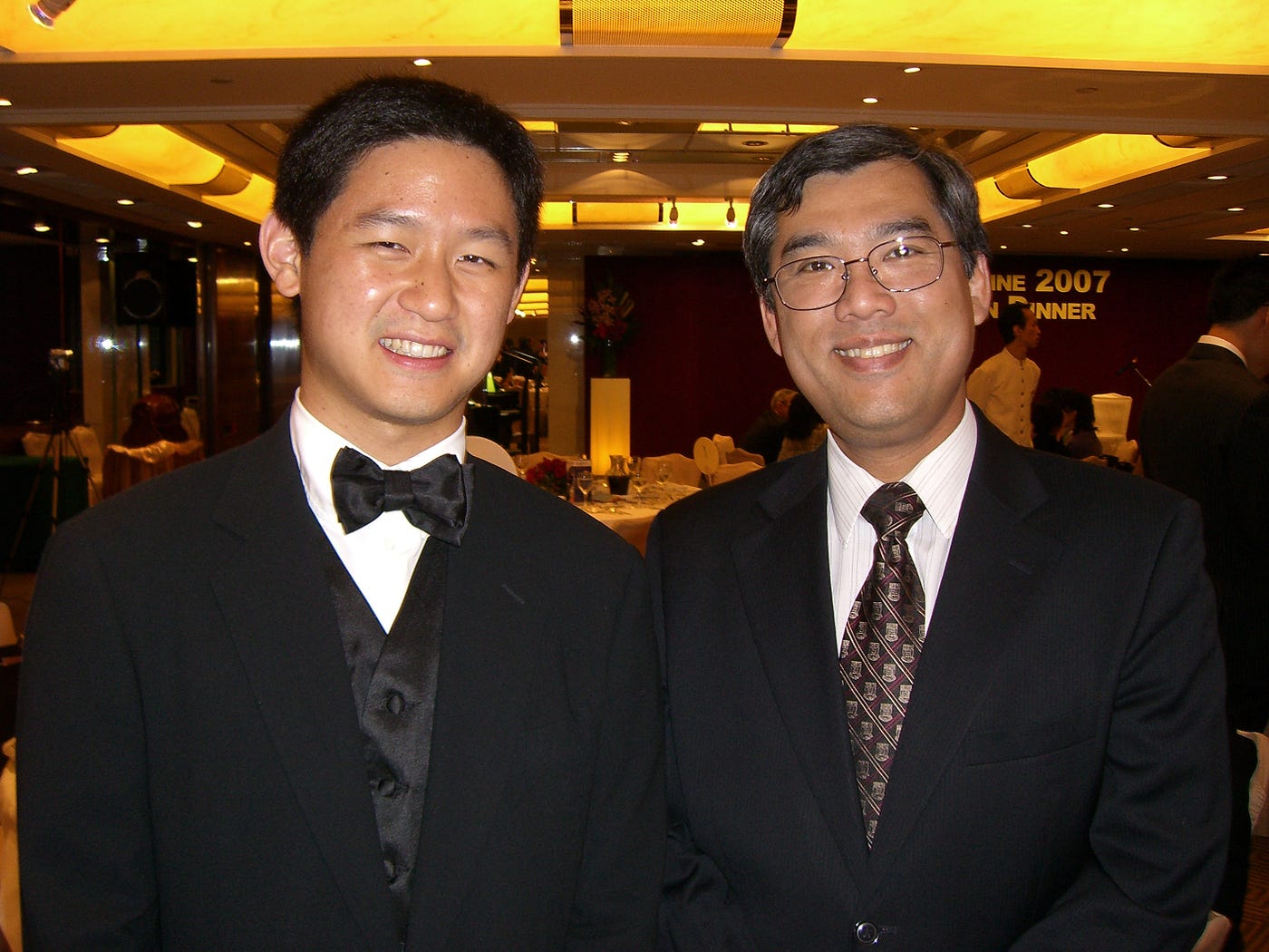 Dr Jason Cheung and Professor Luk at a formal event