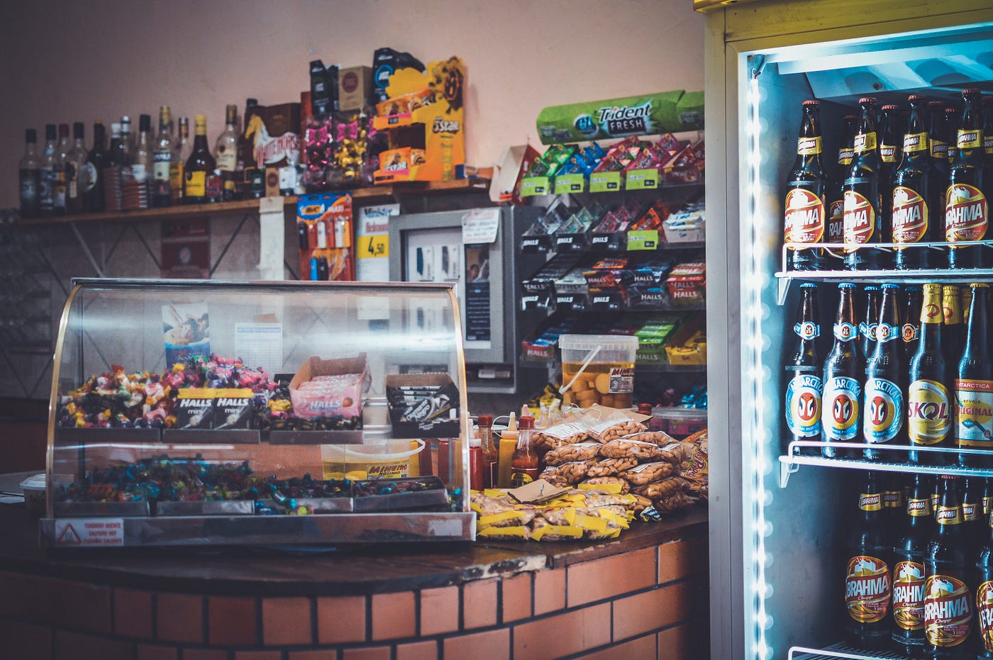Convenience store counter with snacks and sodas