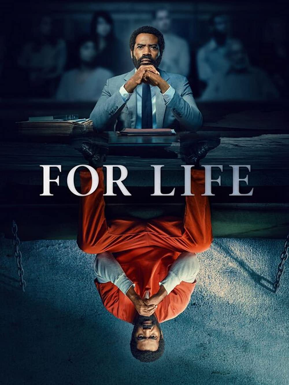 The series poster of For Life. The image is mirrored in the middle. In the top half, you can see Aaron Wallace in a suit in court and in the bottom half, he is sitting in an orange jumpsuit in prison.