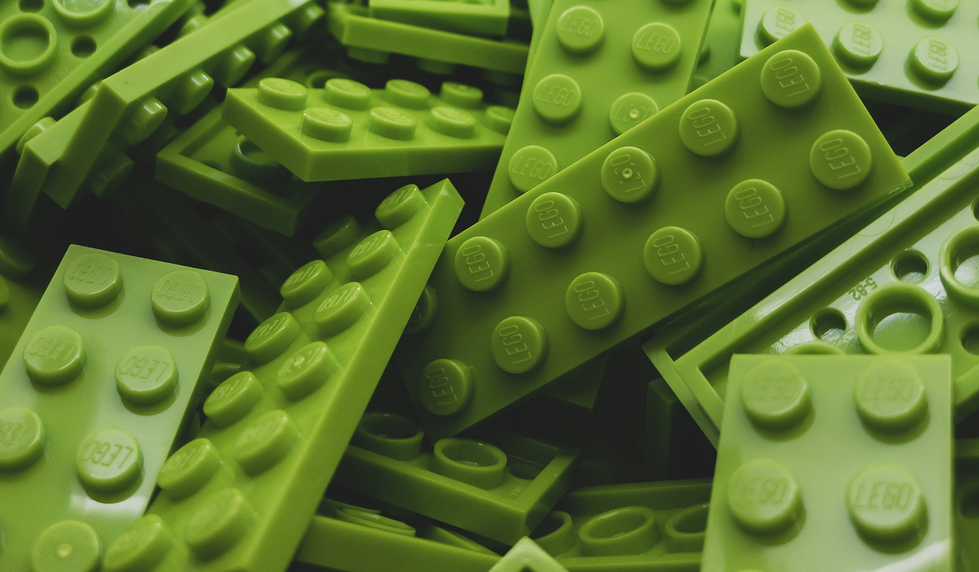 Close up pile of lime green legos.