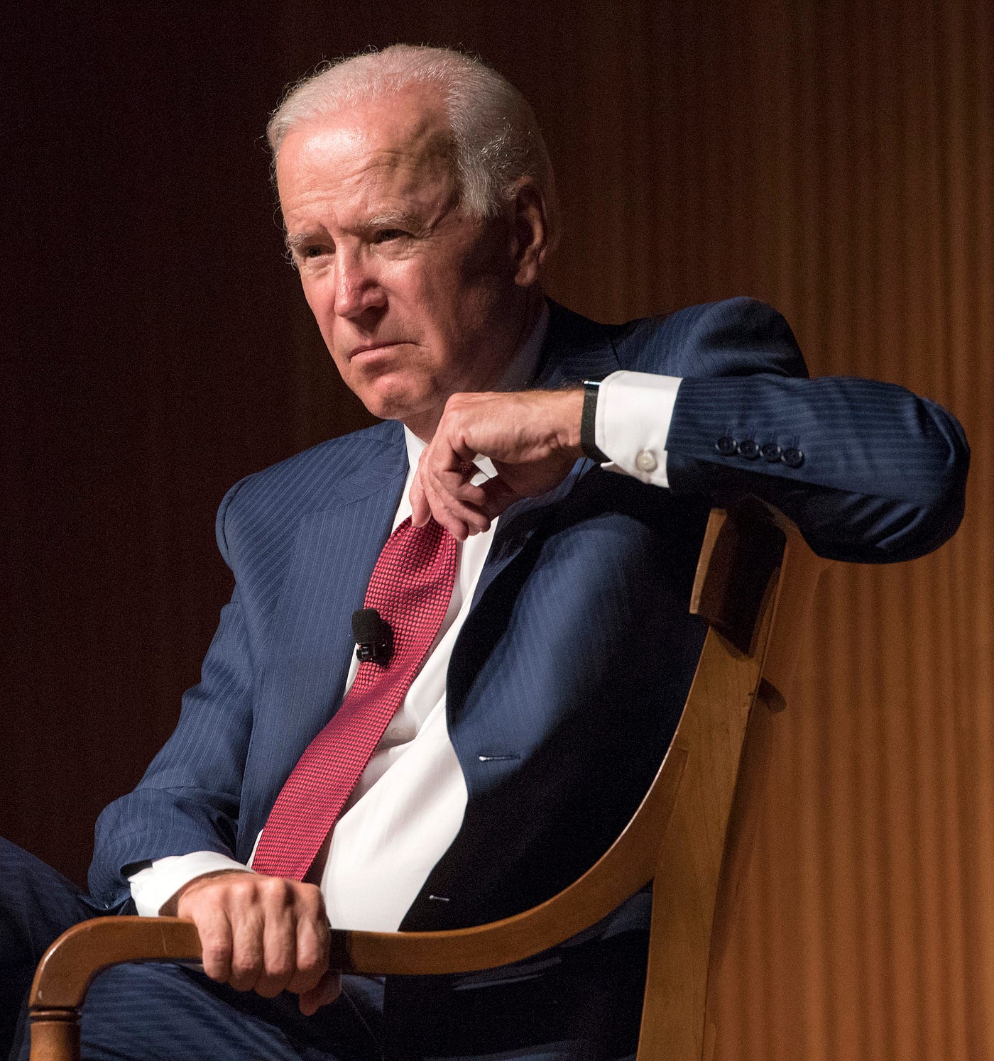 Joe Biden grabbing onto chair