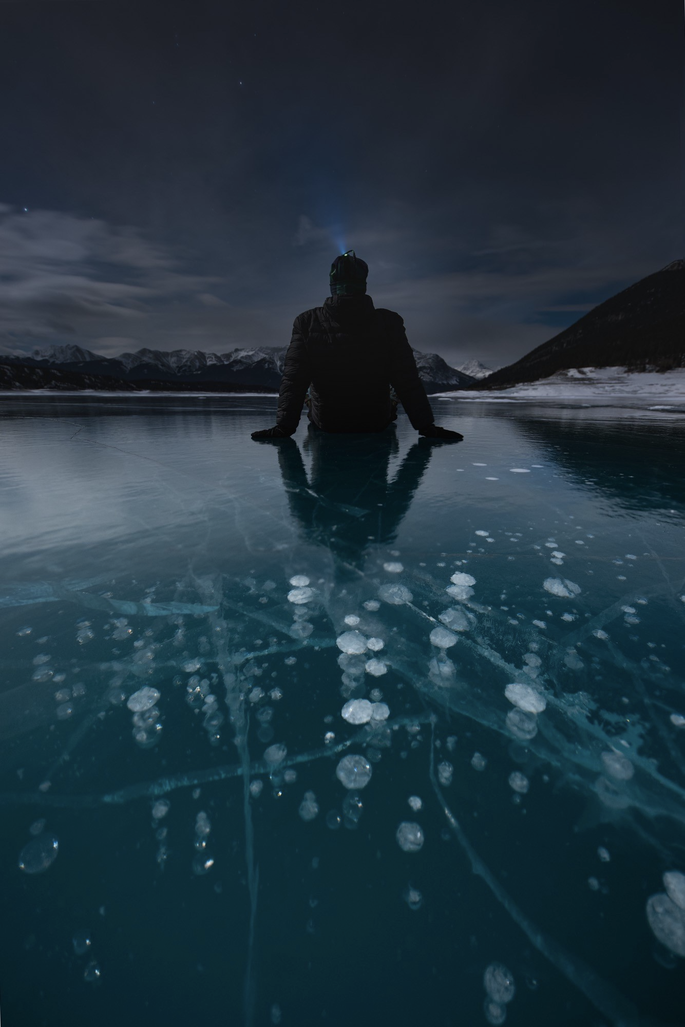 A Night on a Frozen Lake. Random noises surrounded me as I stood… by