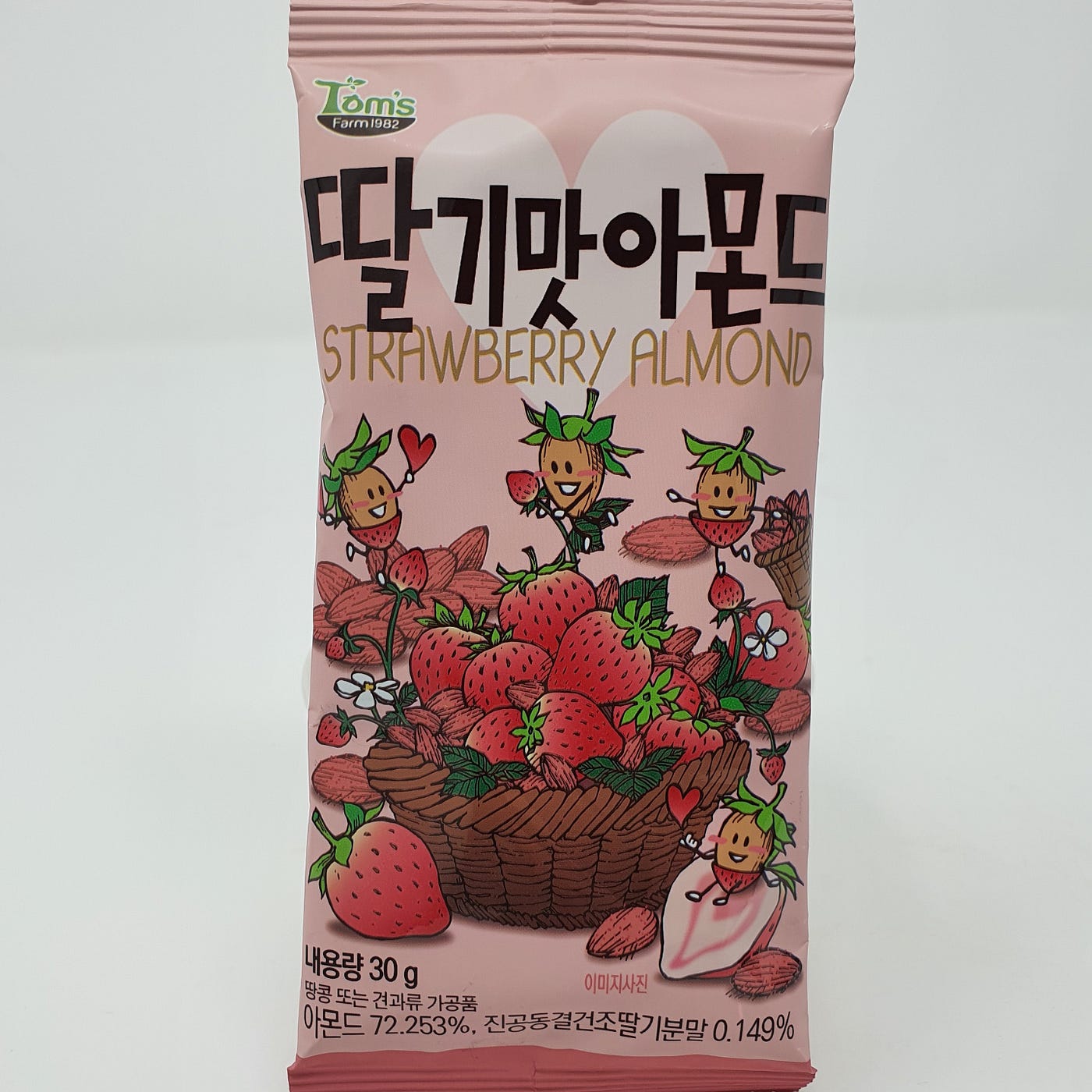 An unopened package of Tom’s Farm Strawberry Almond.