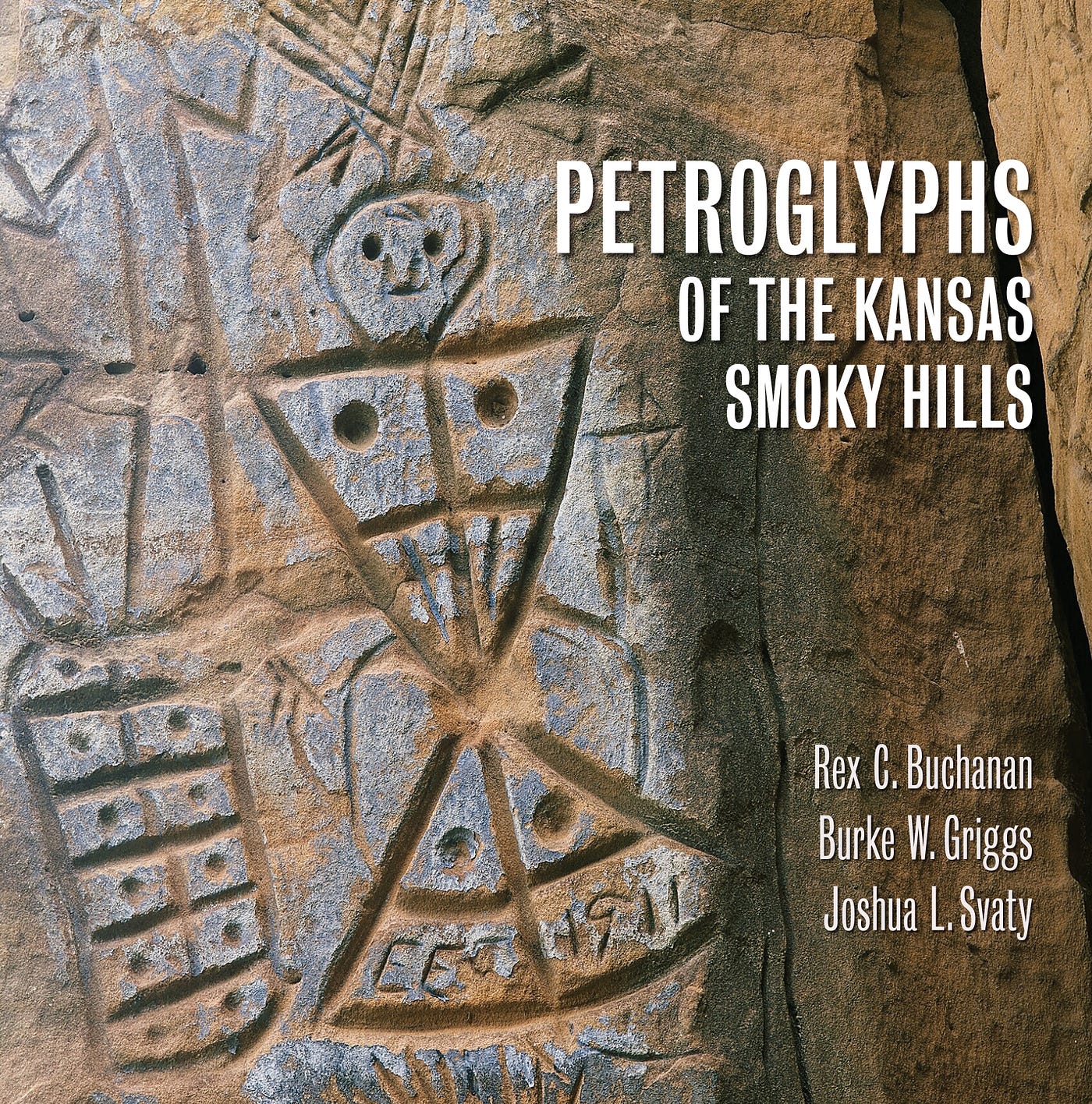 Cover of the book. A carved human figure depicted with dots on its clothing.