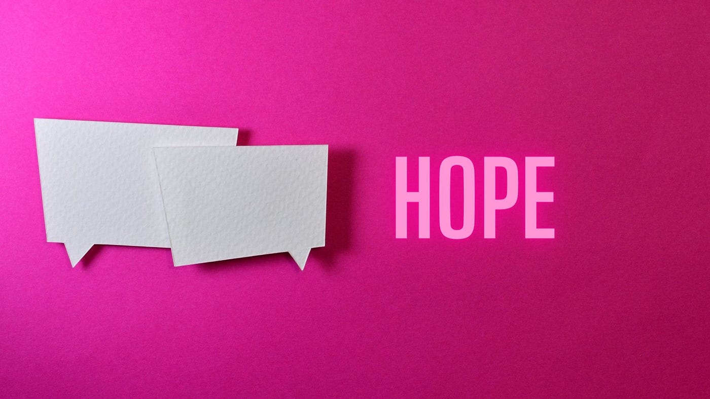 Bright colorful paper with two blank thought bubbles and the word “hope”