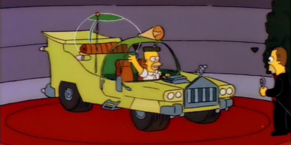 Another image of Homer. This time at the launch of Homer car as a representation of a horrible design.