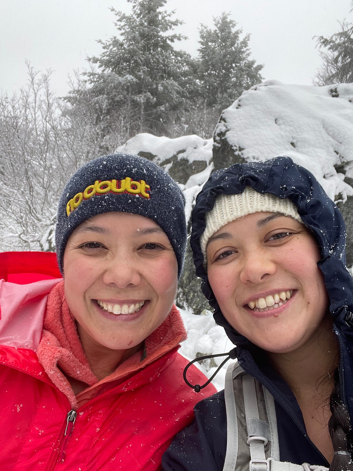 Two sisters enjoy a snowy hike up Mount Si near North Bend. (Sarah Campbell)