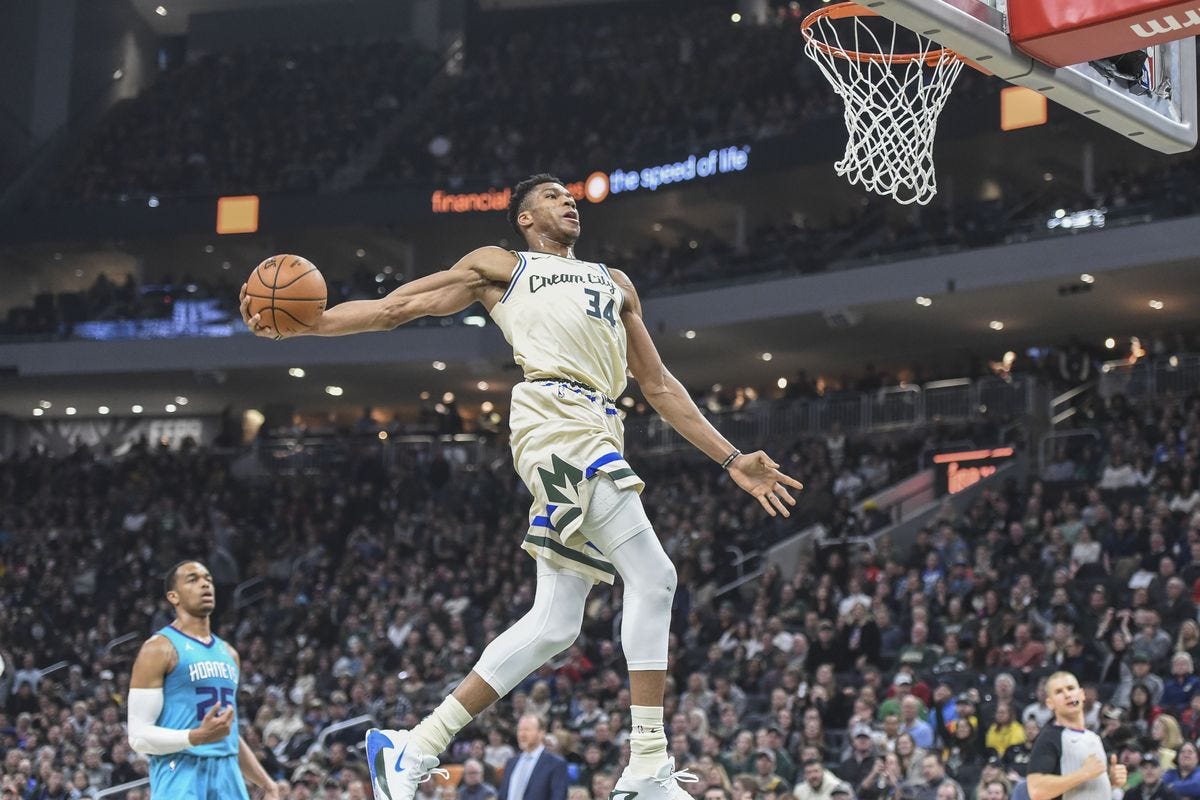 Giannis Antetokounmpo soaring past his competition (Benny Sieu/USA Today Sp...