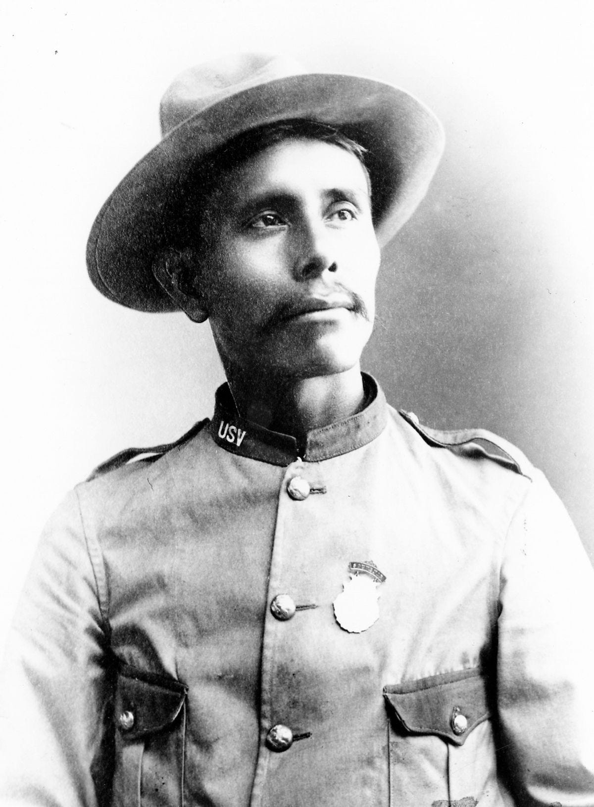 A portrait of William Pollack in a Rough Rider army uniform