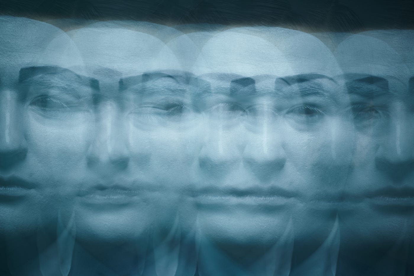 Blurred series of mime faces.