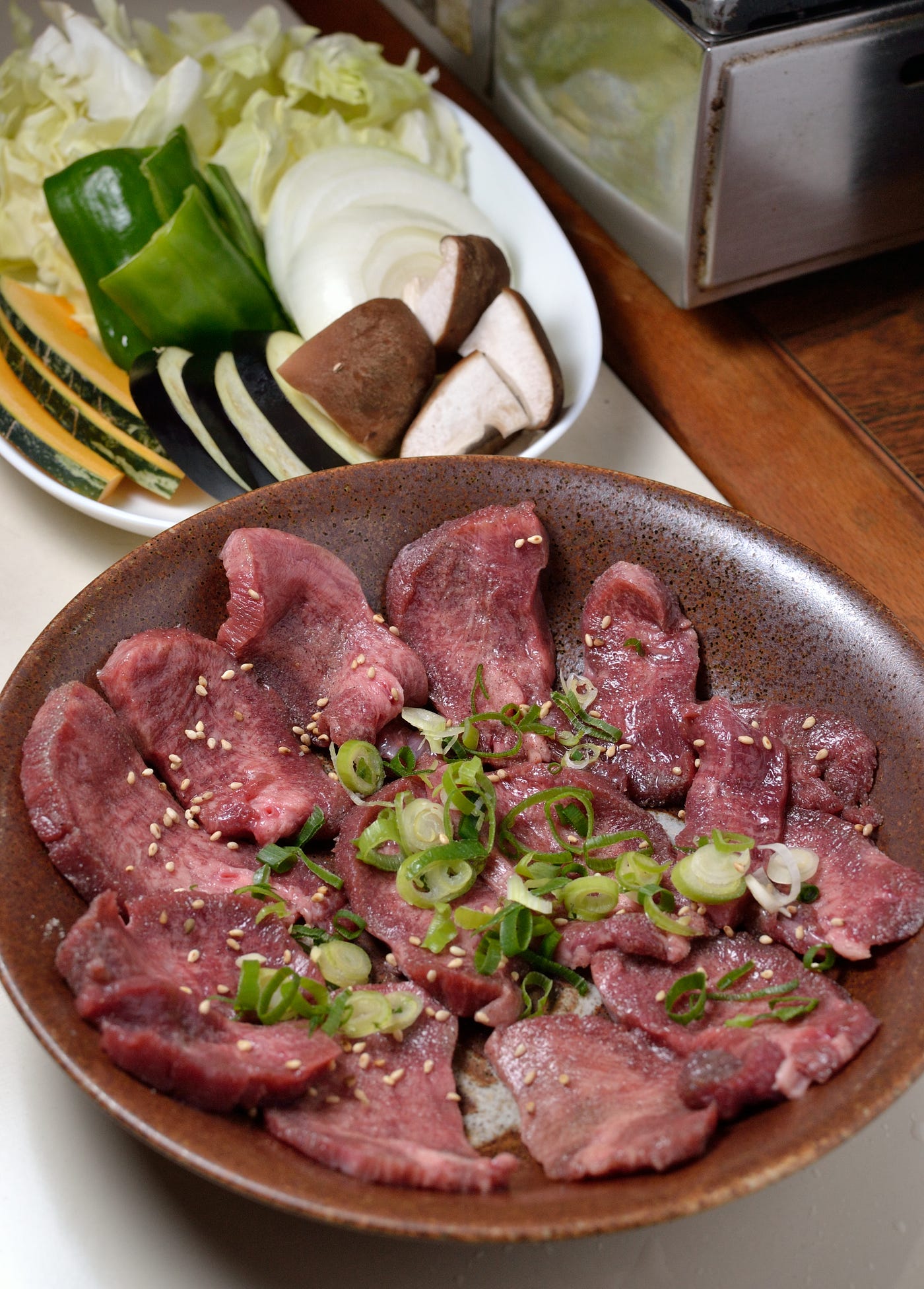 TanYakiniku is BBQ beef tongue. “Yakiniku” literally means “to grill