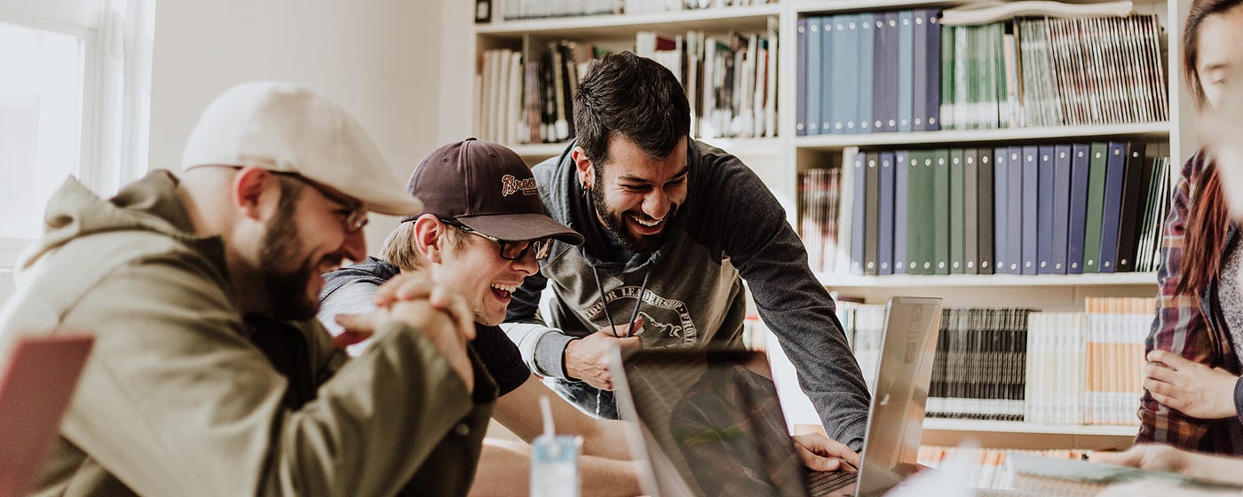 A great design team is working together happily and cheerfully.