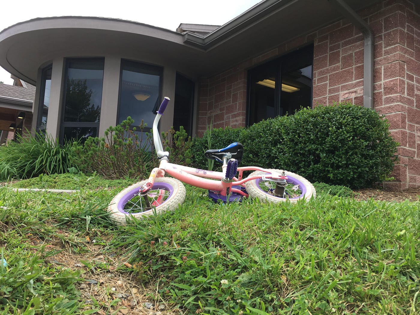 the shelter with a child’s bike in front