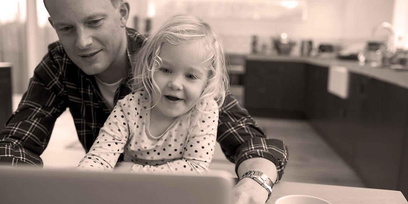 “Internet Safety for kids”, father and daughter on computer