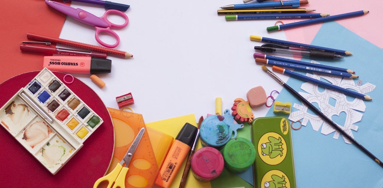 scissors, pencils, paint, markers, school supplies