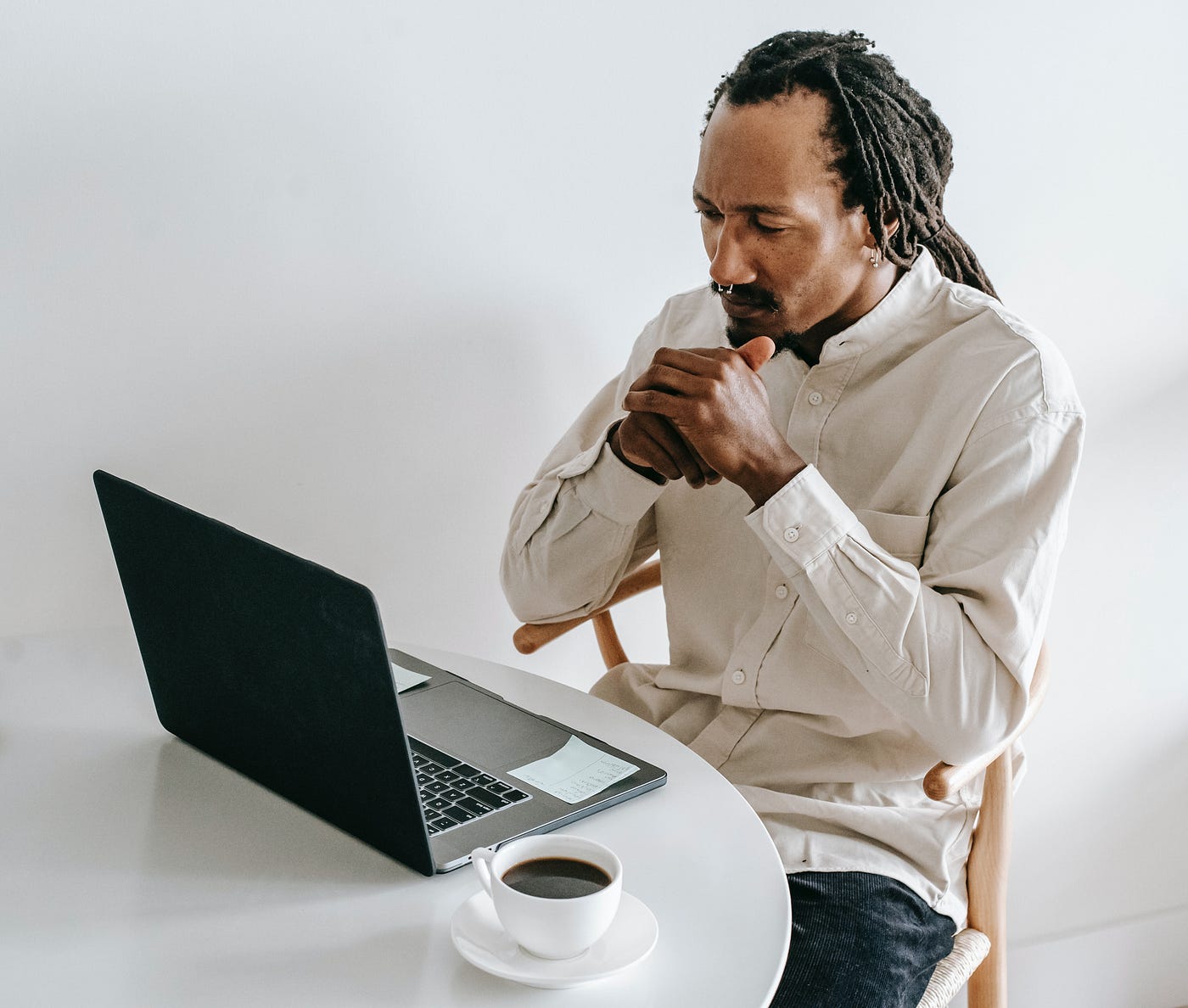 Man reading on his laptop