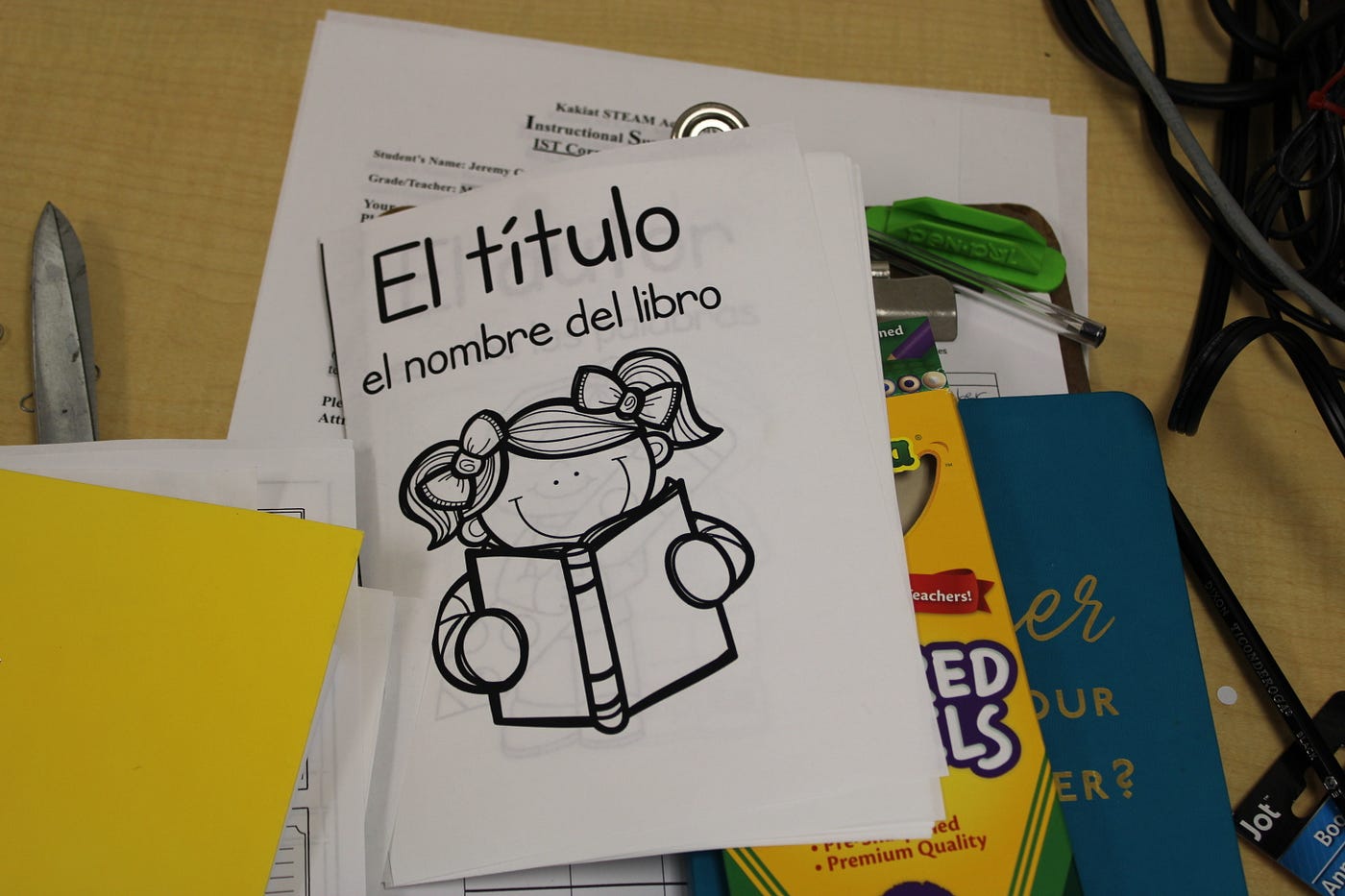 A booklet given to ELL elementary and middle school students. It is sometimes easier for the children to learn class material in their native language before they can make connections with their new English vocabulary. Photo credit: Amaya McDonald