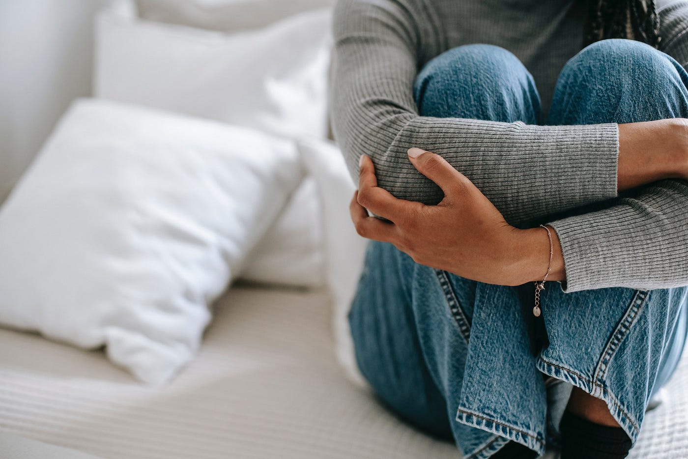 anxious person sitting alone, stay healthy