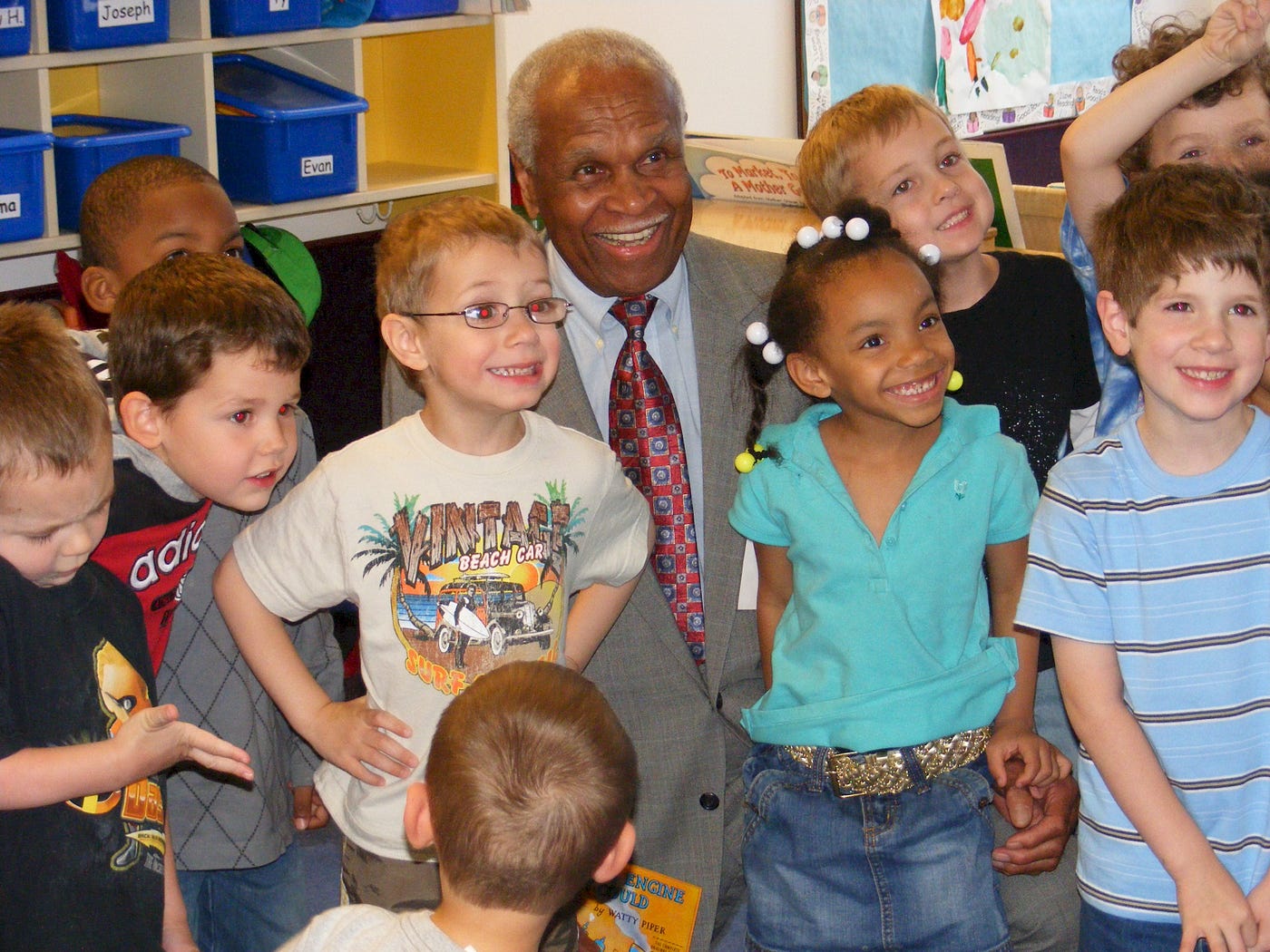 Tom Taylor surrounded by children during a visit to a Pennsylvania early childhood center.