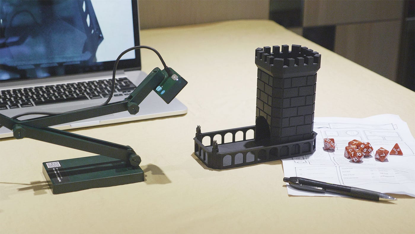 Adjust the multi-jointed arm of your IPEVO document camera to capture and show off your dice rolling skill.