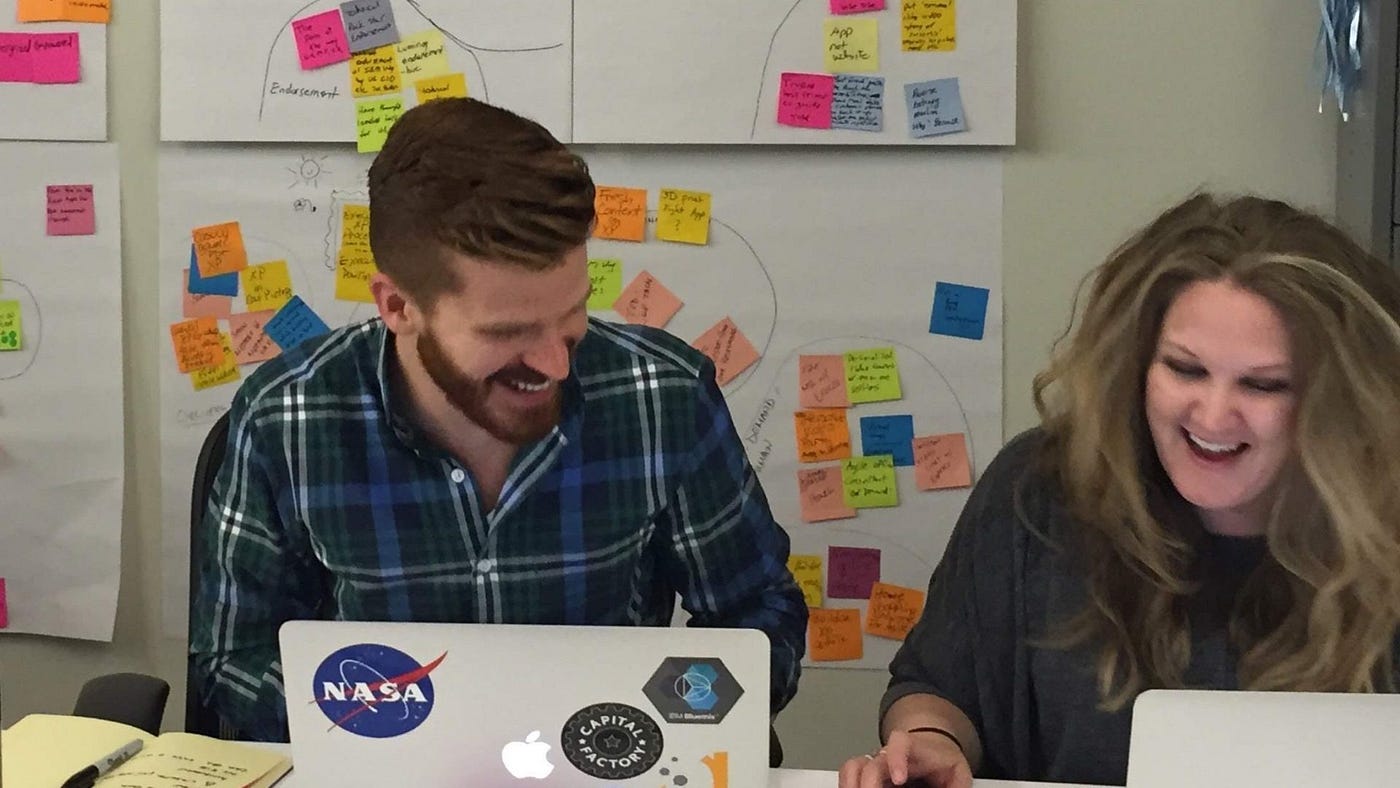 Two Garage consultants working on a shared problem