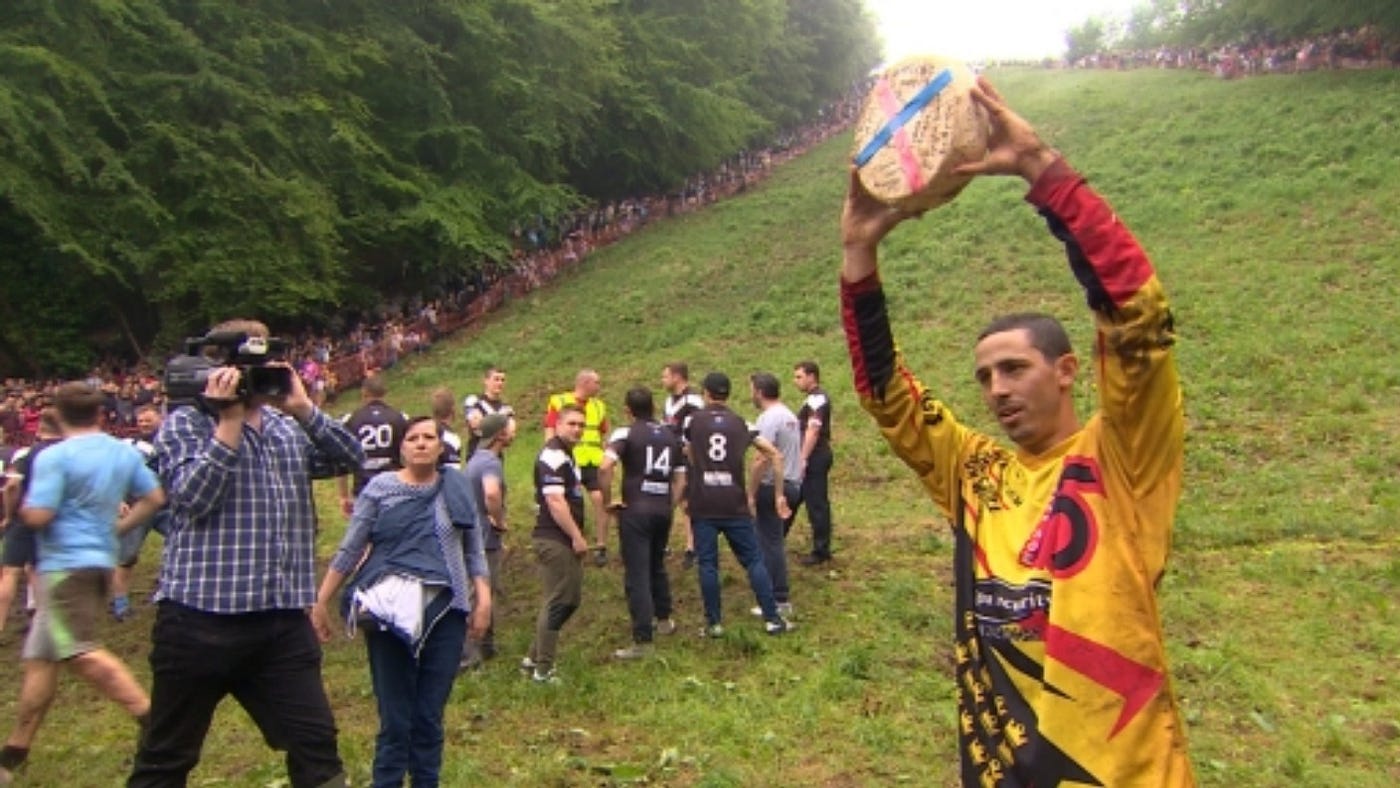 The Culture that Celebrates the Seemingly Dangerous Cheese Rolling Festival  | by Belinda Mallasasime | The Story in History | Medium