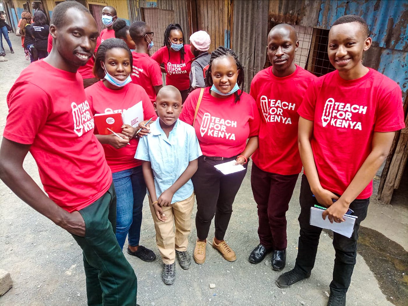 Teach for Kenya Fellows with one of the students