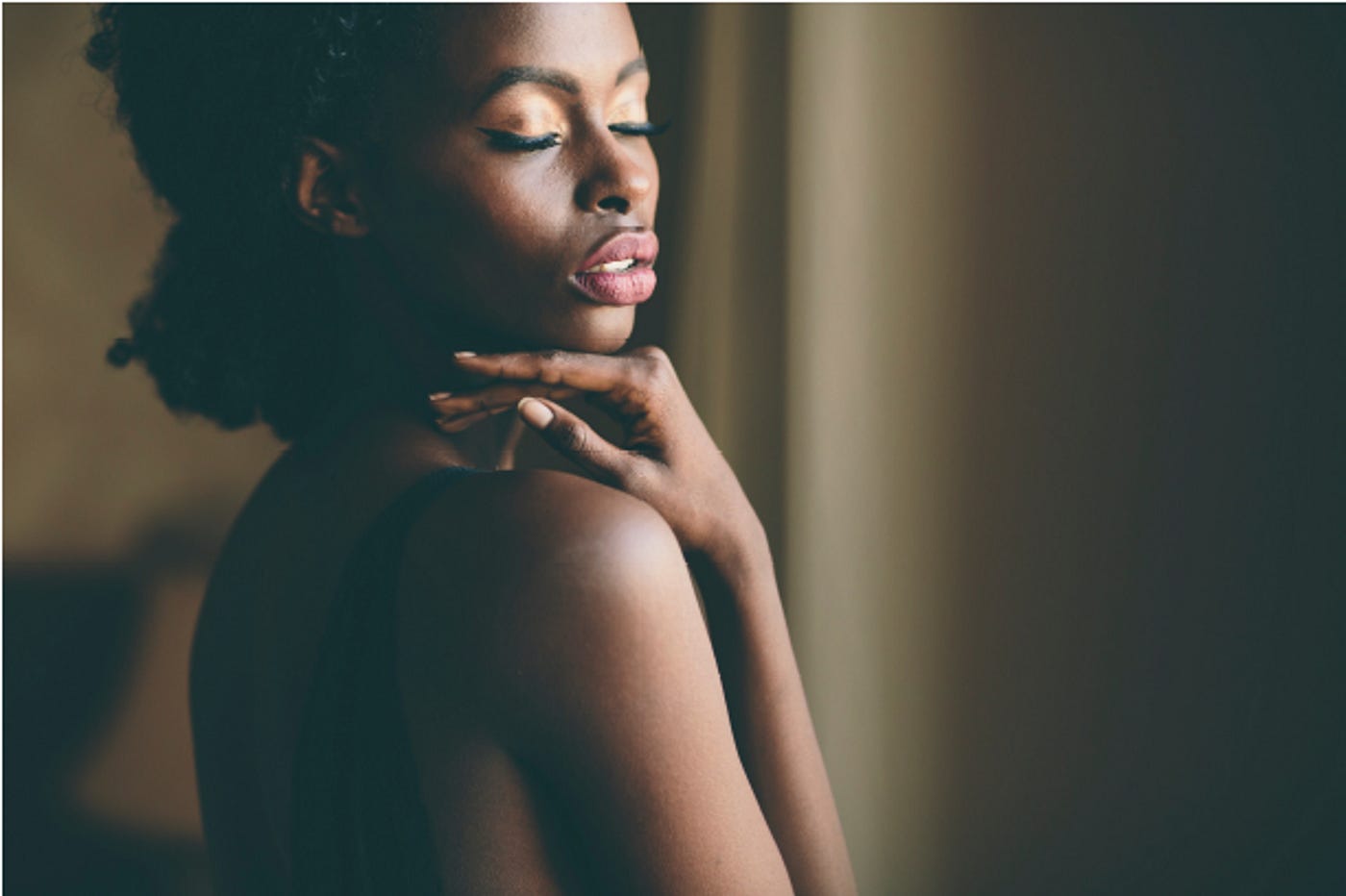 Photo of bare skinned black woman, for Maya Angelou Phenomenal Woman Medium story.