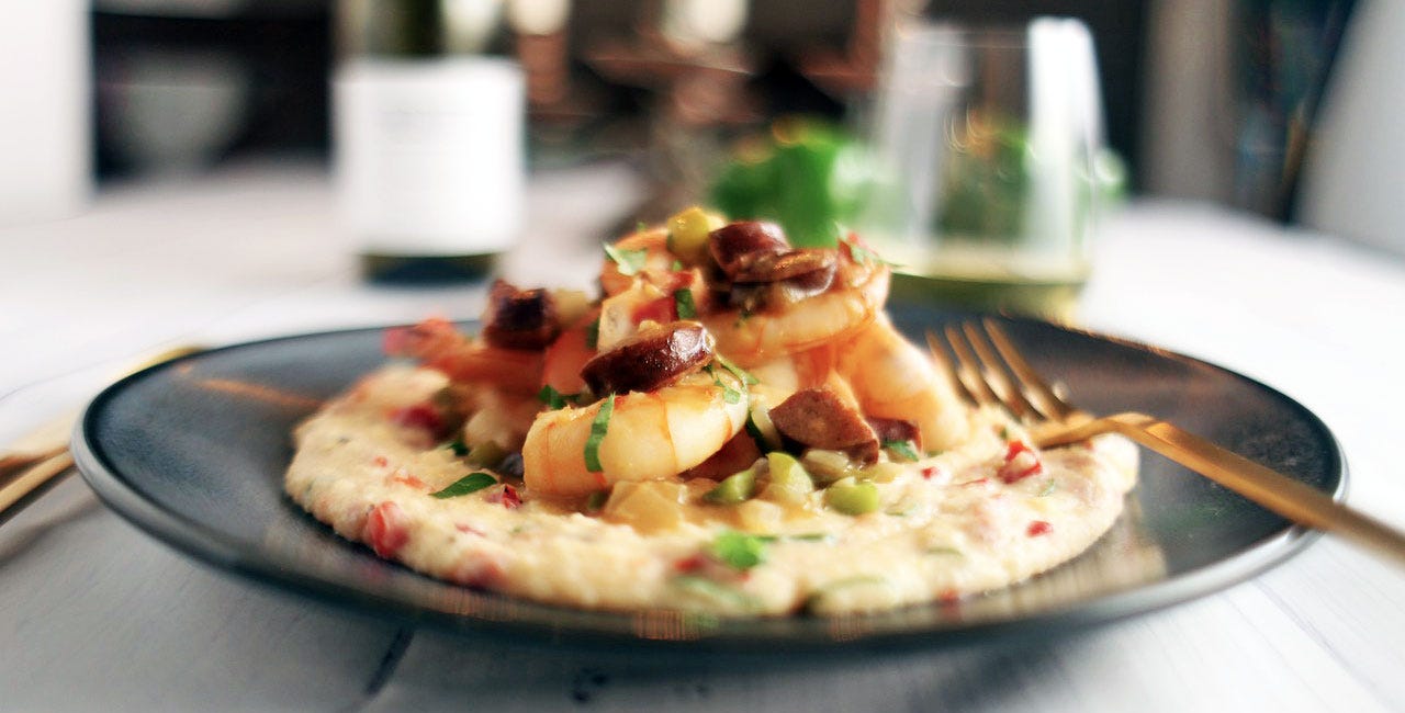 A plate of shrimp and grits
