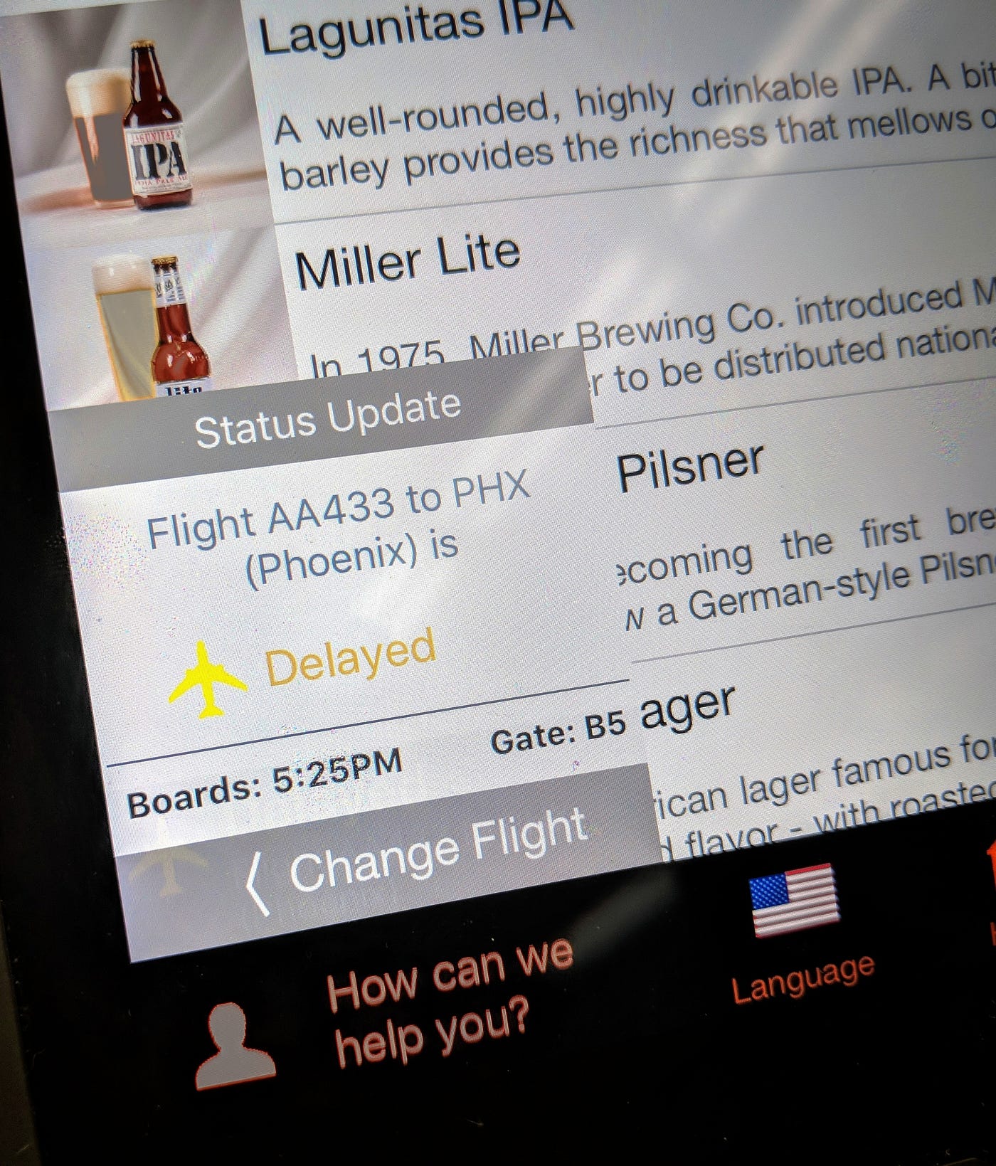 The iPads link to each ticket, along with the pertinent flight info and options for support. Right next to $7.50 bottles of Bud Light.